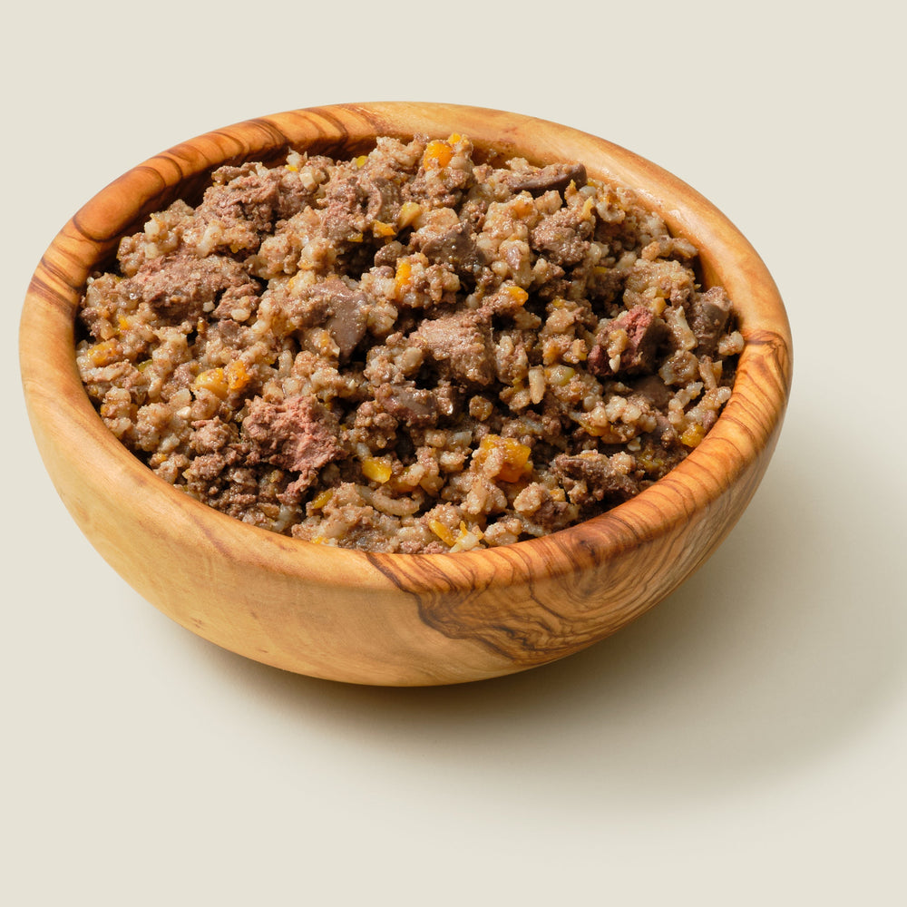
                  
                    Fresh, cooked organic dog food: Organic Gentleman’s Chicken Banquet with organic chicken, butternut squash, and white rice for healthy digestion in a natural bowl
                  
                